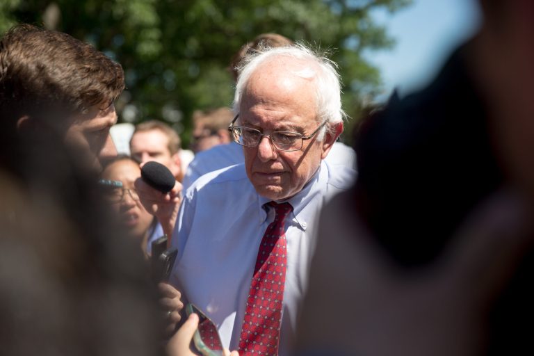 Democratic presidential candidate Sen. Bernie Sanders, I-Vt., departs after speaking to federal contract workers at a rally on Capitol Hill in Washington, Wednesday, July 22, 2015, to push for a raise to the minimum wage to $15 an hour. (AP Photo/Andrew Harnik)