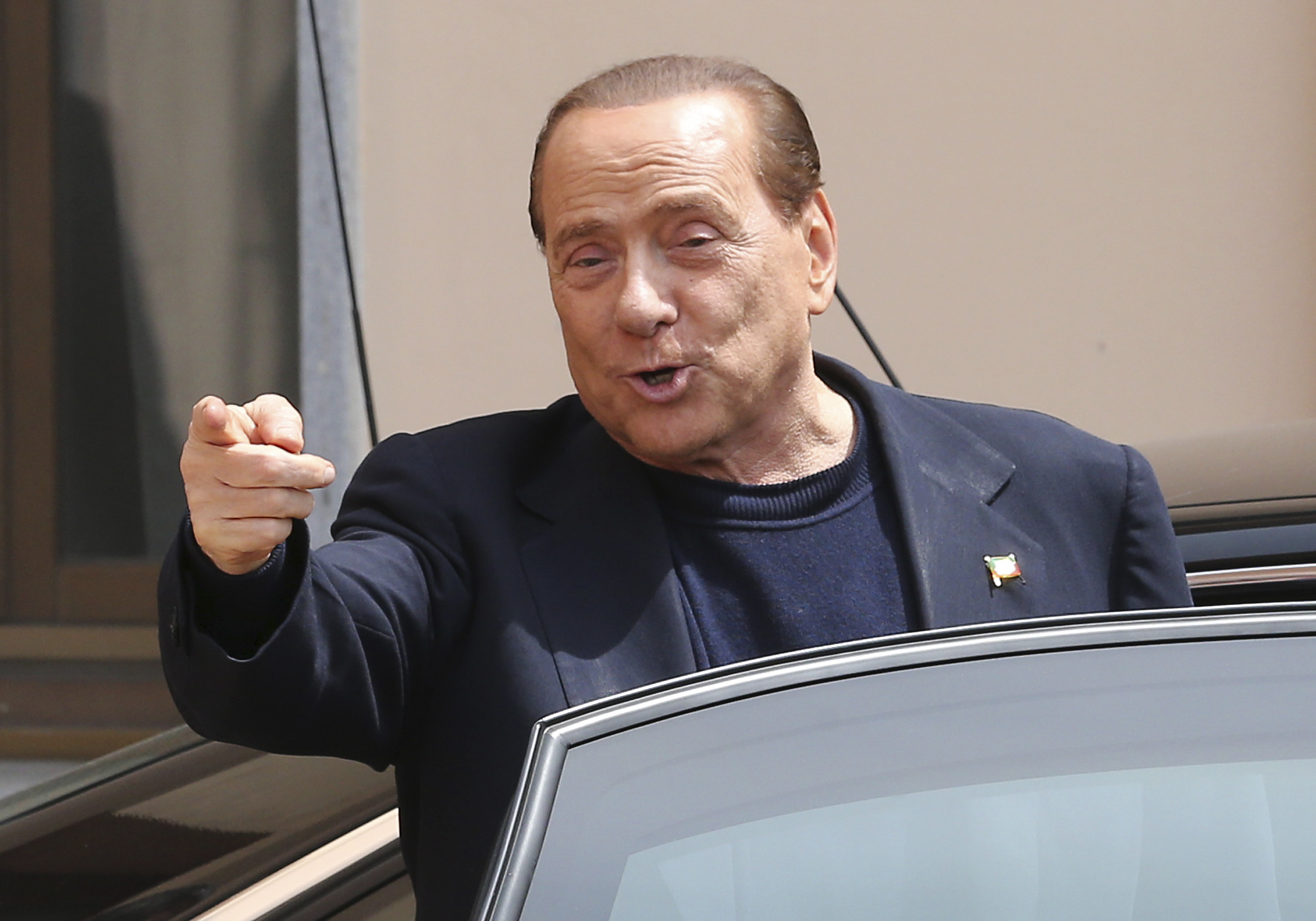 Italian court: Berlusconi unaware of teen’s age