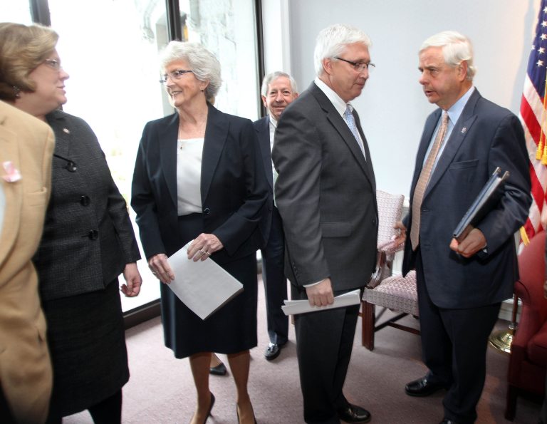 State Sen., Jeb Bradley, right, talks with Senate President Chuck Morse before announcing a Senate plan for Medicaid Expansion  Thursday, Nov. 7, 2013, in Concord, N.H. The New Hampshire Legislature convenes for a special two-week session to take up Medicaid expansion. (AP Photo/Jim Cole)