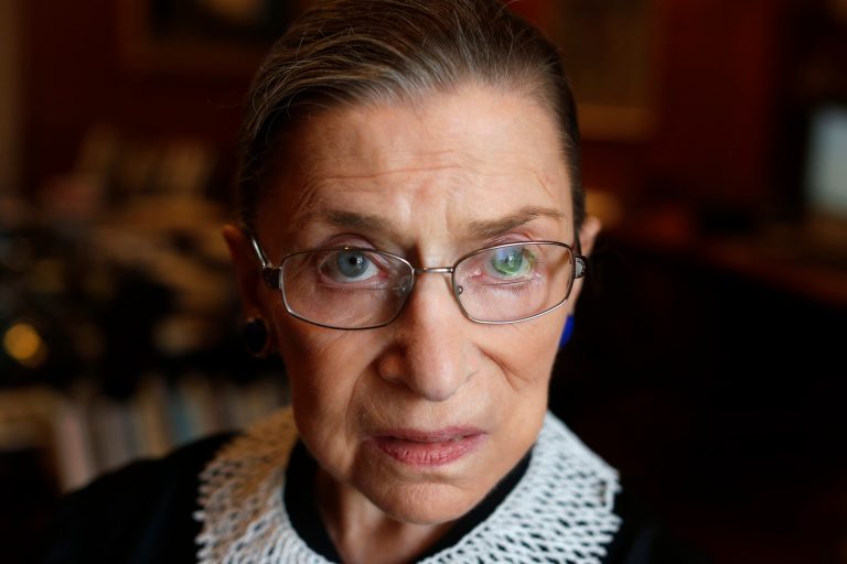   FILE - In this July 24, 2013, file photo Associate Justice Ruth Bader Ginsburg poses for a photo in her chambers at the Supreme Court in Washington, before an interview with the Associated Press. Ginsburg will officiate at a same-sex wedding this weekend in what is believed to be a first for a member of the nationâs highest court. Ginsburg will officiate Saturday, aug. 31, 2013, at the marriage of Kennedy Center President Michael Kaiser and John Roberts, a government economist. Kaiser told The Associated Press he asked Ginsburg to officiate because she is a longtime friend. (AP Photo/Charles Dharapak, File)  