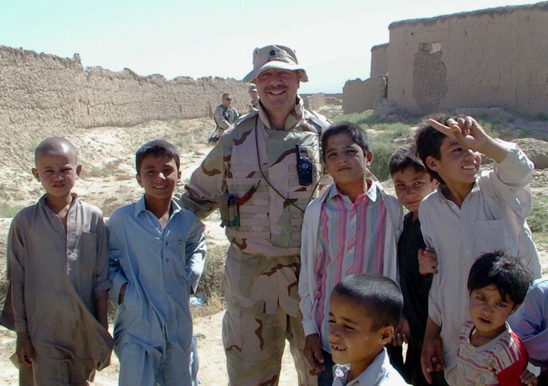 Army Reserve Aviation Specialist, Lt. Col. Chuck Schlom, pictured here on a Provincial Reconstruction Team mission, deployed to Afghanistan in 2005. When his employer found out about his upcoming deployment, Schlom was fired. Schlom says his firing was illegal under the Uniformed Services Employment and Reemployment Rights Act. Photo courtesy of Chuck Schlom**Images for use with and promoting News21 project Sept 2013, Back Home: The Challenges Facing Post-9/11 Veterans Returning from the Wars in Iraq and Afghanistan. Story: USERRA**