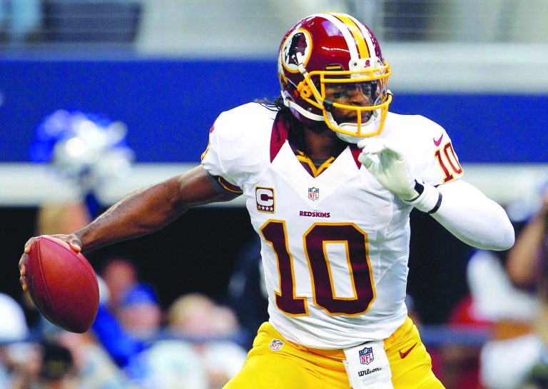 Tom Pennington/Getty Images
Quarterback Robert Griffin III threw eight touchdown passes in a five-day span as the Redskins beat the Eagles and Cowboys to get back into the NFC playoff picture.