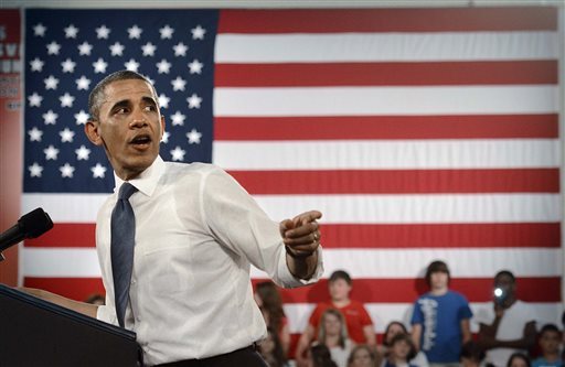 President Barack Obama speaks to students at Mooresville Middle School Thursday, June 6, 2013 in Mooresville, N.C. President Barack Obama says he wants 99 percent of American students connected to super-fast Internet within five years. (AP Photo/The Charlotte Observer, John D. Simmons) 