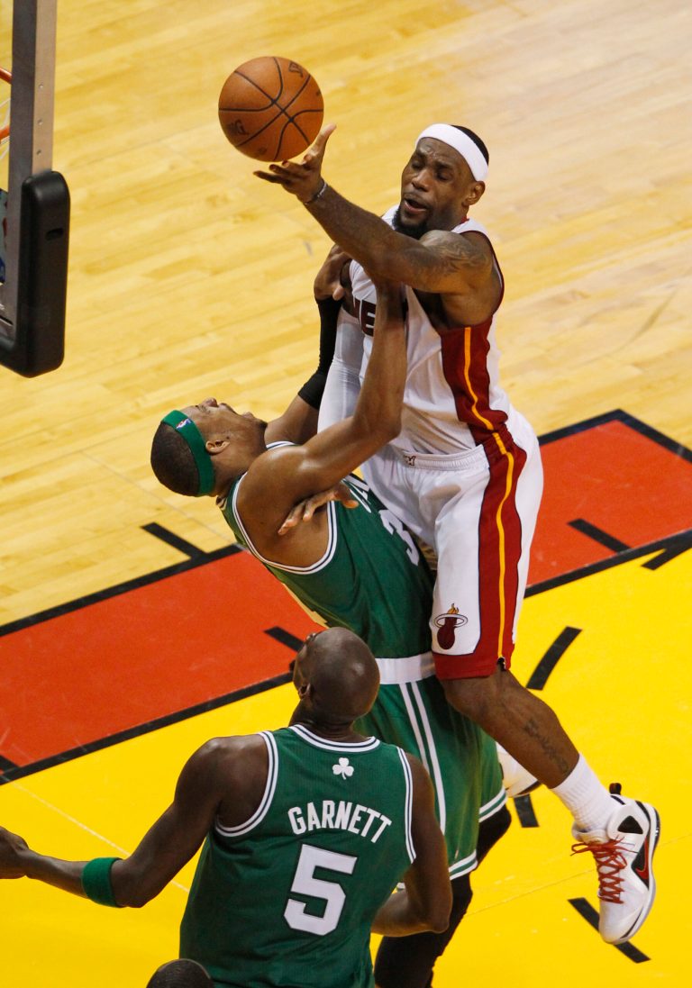   Miami Heat's LeBron James (6) drives to the basket over Boston Celtics' Paul Pierce (34) during the second half of Game 7 of the NBA basketball playoffs Eastern Conference finals, Saturday, June 9, 2012, in Miami. At bottom is Kevin Garnett (5). AP Photo/Wilfredo Lee)  