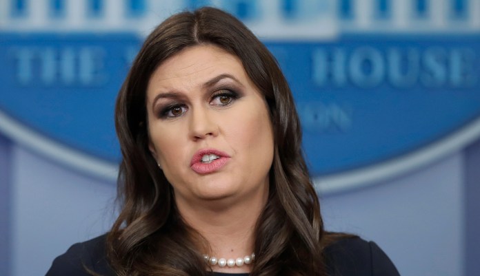 "Whether it's a real video, the threat is real," Sanders told reporters. "[Trump's] goal is to promote strong border security and strong national security." (AP Photo/Alex Brandon)