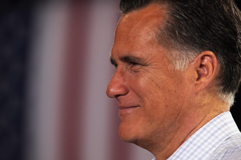 MIAMI, FL - SEPTEMBER 19:  Republican presidential candidate, former Massachusetts Gov. Mitt Romney smiles during a Juntos Con Romney Rally at the Darwin Fuchs Pavilion, on September 19, 2012 in Miami, Florida. Romney continues to campaign for votes around the country.  (Photo by Joe Raedle/Getty Images)