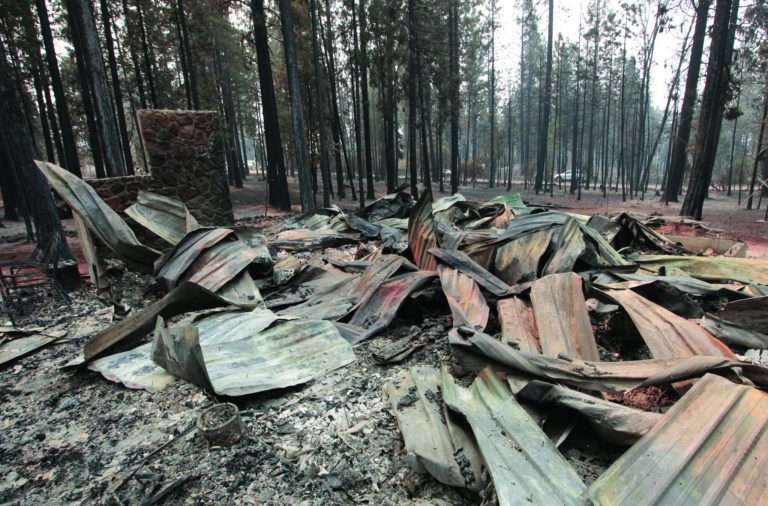 The burned remains of a home destroyed by a Ponderosa fire are seen near Manton, Calif., Monday, Aug. 20, 2012. More than 1,400 fire fighters are battling the fire that has destroyed seven homes, burned 23 square miles. The fire that started Saturday is just 5 percent contained. (AP Photo/Rich Pedroncelli)