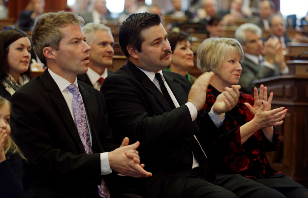 Son of Iowa governor compliments Cruz, sort of