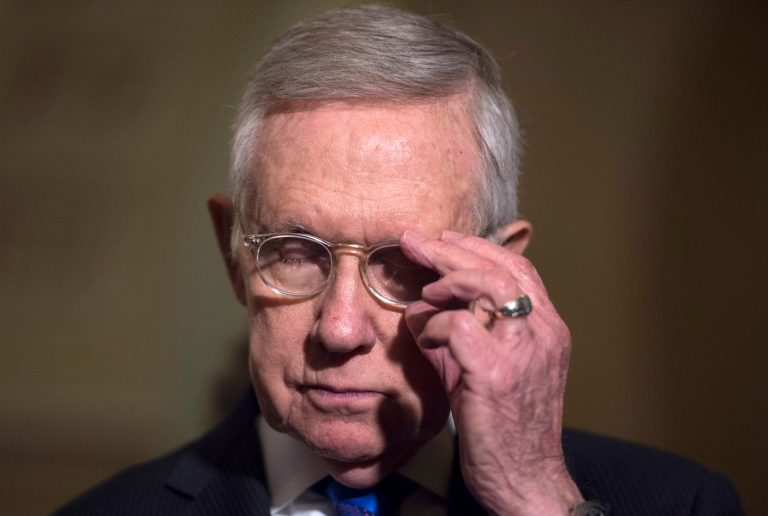 One of outgoing Senate Majority Leader Harry Reid's greatest legislative achievements will come back to haunt Democrats early next year. (AP Photo/Molly Riley)
