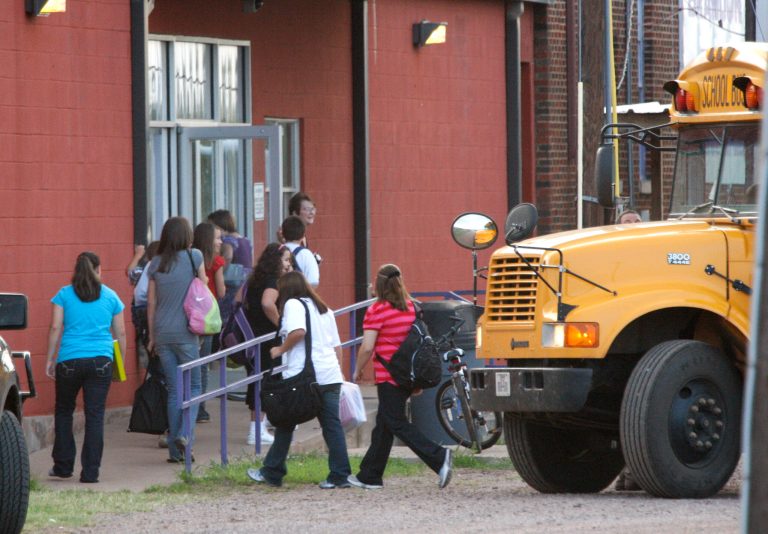   In this Aug. 25, 2008 photo, students arrive for the first day of classes at the Harrold Independent School District in Harrold, Texas. The school has a policy allowing teachers and other employees to carry concealed weapons on campus. Some lawmakers in at least five other states are looking into similar legislation in the wake of last week's deadly elementary school shooting in Newton, Conn. Anti-gun groups oppose the measure. (AP Photo/The Fort Worth Star-Telegram, Ron T. Ennis) MAGS OUT; (FORT WORTH WEEKLY, 360 WEST); INTERNET OUT  