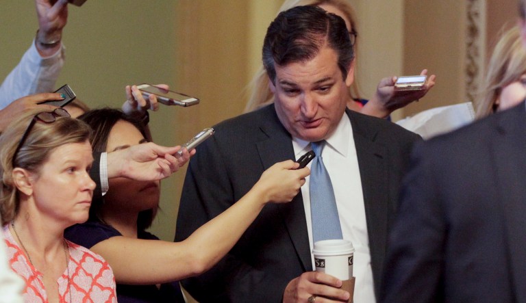 Sen. Ted Cruz, R-Texas, is pursued by members of the media while walking the hallways on Capitol Hill in Washington on Thursday, July 13, 2017. (AP Photo/Pablo Martinez Monsivais)