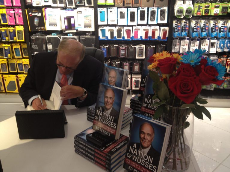 Former Pennsylvania Gov. Ed Rendell signs books at the Charlotte airport. (Nikki Schwab/Examiner)