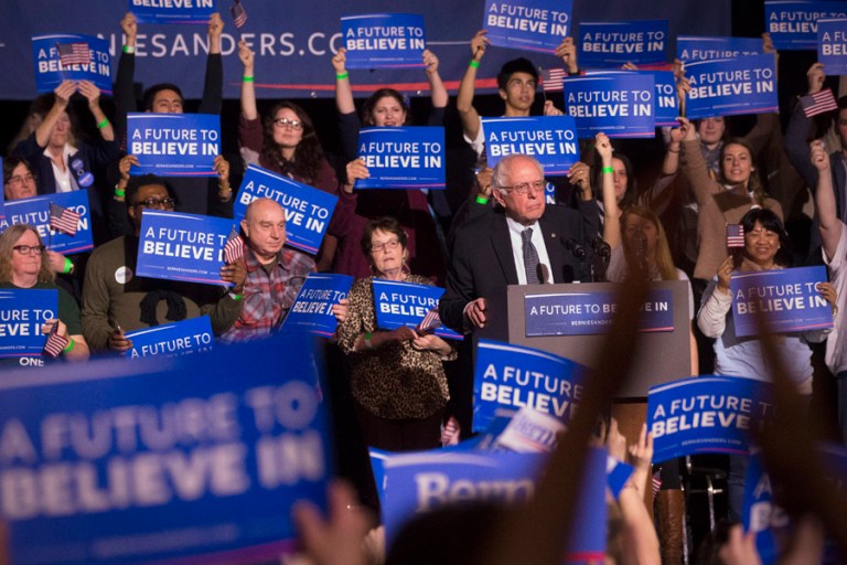 The Vermont senator also pulled in $3 million after his narrow loss in Monday's caucuses. (AP photo/John Minchillo)