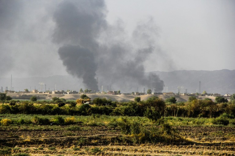 In this Thursday, July 31, 2014, file photo, smoke rises from an oil refinery in Beiji, some 250 kilometers (155 miles) north of Baghdad, Iraq, after an attack by Islamic militants. (AP)