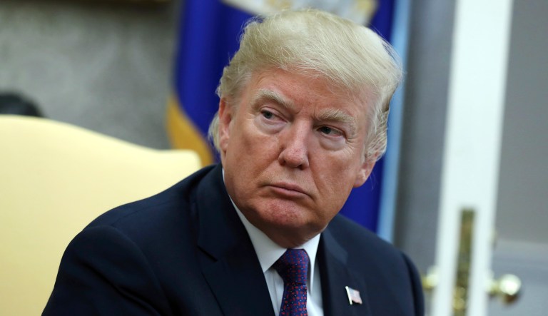 President Donald Trump listens during a meeting in the Oval Office of the White House, Thursday, Oct. 19, 2017, in Washington. (AP Photo/Evan Vucci)