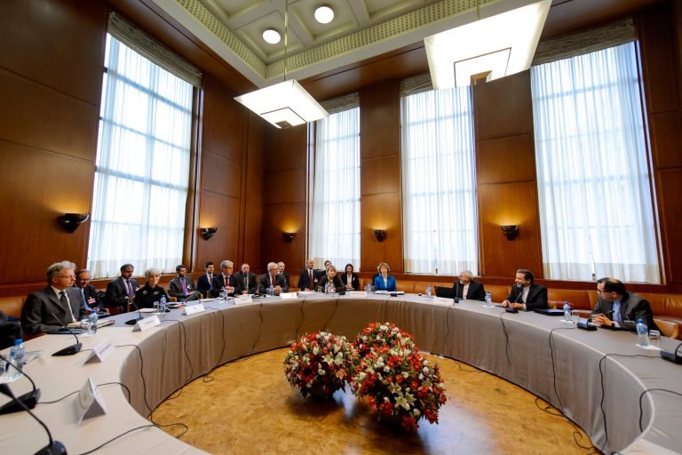 National representatives sit prior to the start of the two days of closed-door nuclear talks on Tuesday at the United Nations offices in Geneva, Switzerland. (AP/Fabrice Coffrini)