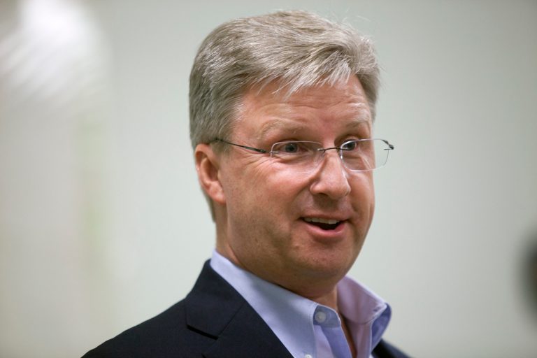 This photo taken Nov. 7, 2013 shows Idaho Republican candidate Bryan Smith answering questions at a town hall meeting with local residence during a campaign stop for the House seat in Idaho's 2nd Congressional District, in Montpelier, Idaho. (AP Photo/Kim Raff)