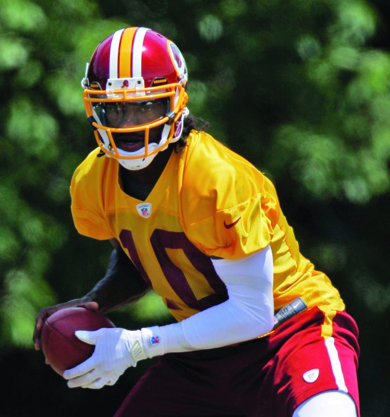 Pablo Martinez Monsivais/AP
Washington Redskins quarterback Robert Griffin III is the first player among the top eight draft picks to sign a contract.