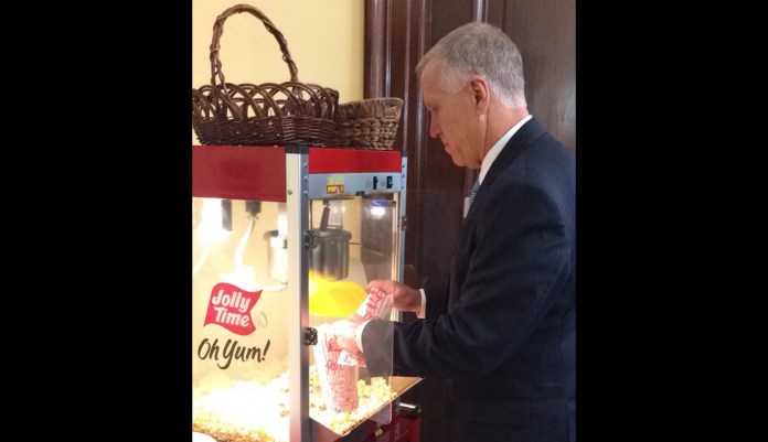 Sen. Thom Tillis posted tweeted a picture of himself grabbing some popcorn with the caption: "Ready for lunch with POTUS and @SenateGOP." (Thom Tillis/Twitter)