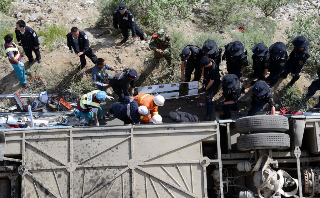 Tibet tour bus plummets into valley, killing 44