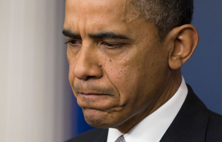   President Barack Obama pauses as he talks about the fiscal cliff negotiations during a news conference in the briefing room of the White House on Wednesday, Dec. 19, 2012 in Washington. Obama also announced that Vice President Joe Biden will lead an administration-wide effort to curb gun violence in response to the Connecticut school shooting. (AP Photo/ Evan Vucci)  