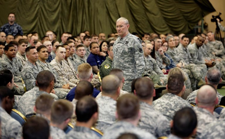 In this April 25, 2013 file photo, Joint Chiefs Chairman Gen. Martin Dempsey speaks to soldiers of the U.S. Armed Forces in Japan at Yokota Air Base on the outskirts of Tokyo. An Associated Press investigation into the militaryâs handling of sexual assaults in Japan has found a pattern of random and inconsistent judgments in which most offenders are not incarcerated. Instead, commanders have ordered ânonjudicial punishmentsâ that ranged from docked pay to a letter of reprimand. (AP Photo/Shizuo Kambayashi, File)