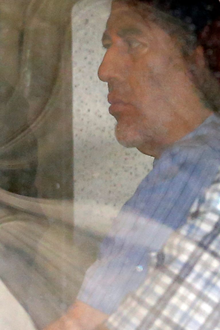 Drug boss Vicente Carrillo Fuentes sits after his arrest, in a helicopter in the hangar of the Mexican Attorney Generals Office in Mexico CIty, Thursday Oct. 9, 2014. Carrillo Fuentes was taken into custody at a traffic checkpoint without a shot being fired, National Security Commissioner Monte Alejandro Rubido said. (AP Photo/Dario Lopez-Mills)