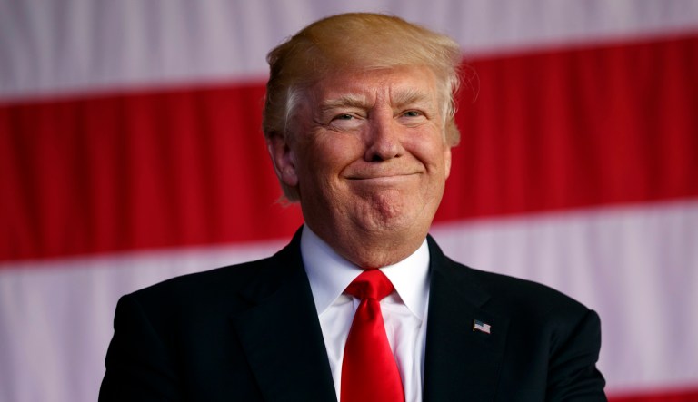 President Trump responded early Wednesday morning to the explosion of responses on Twitter over an unfinished tweet he sent hours earlier. (AP Photo/Evan Vucci)