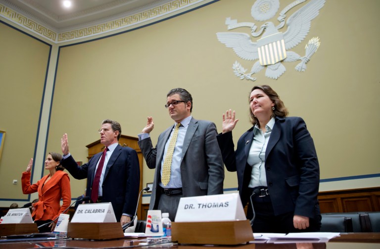 The Cato Institute's Mark Calabria (pictured second from the left) is a top critic of former President Barack Obama's Wall Street reform laws. (AP Photo/J. Scott Applewhite)