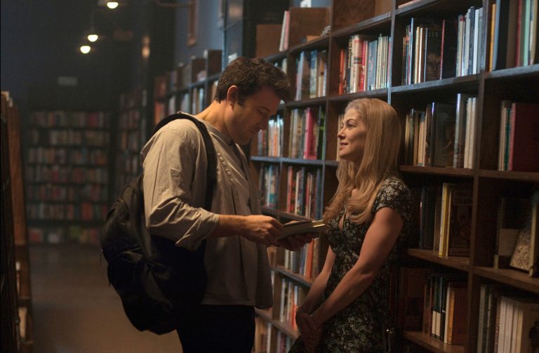 In this image released by 20th Century Fox, Ben Affleck, left, and Rosamund Pike appear in a scene from 