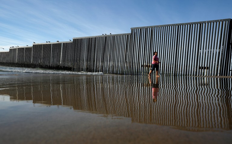 The offer follows signals from the Trump administration that it would not insist the spending bill include money to pay for the wall on the southern border promised during the campaign. (AP Photo/Gregory Bull)