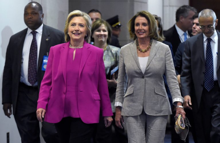 Democratic presidential candidate Hillary Clinton walks with House Minority Leader Nancy Pelosi of Calif. on Capitol Hill in Washington, Tuesday, July 14, 2015. Clinton is attend meetings on Capitol Hill with House and Senate Democrats. (AP Photo/Susan Walsh)