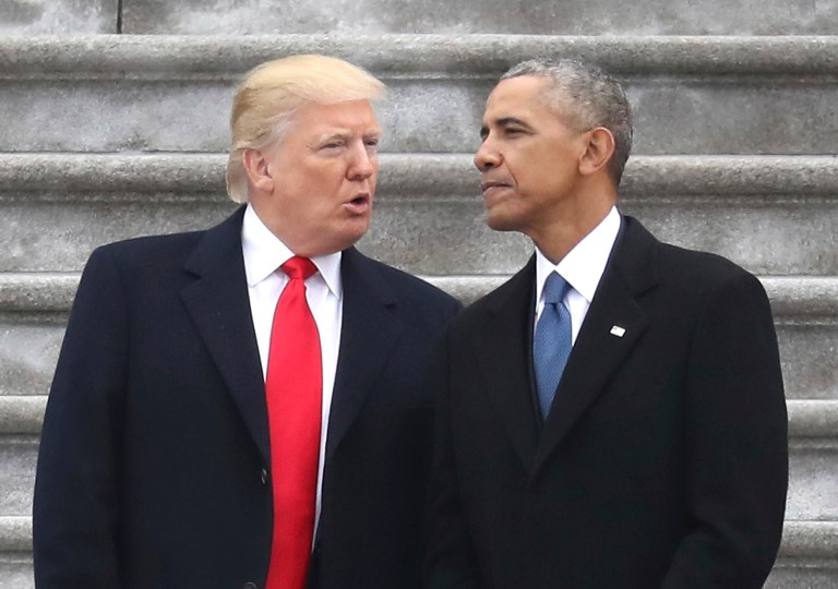 Donald Trump and talks with former President Barack Obama on Trump's Inauguration Day. The Wall Street Journal reported Obama is livid at Trump following his weekend tweets accusing the former president of ordering an illegal wiretap. (Rob Carr/Pool Photo via AP)