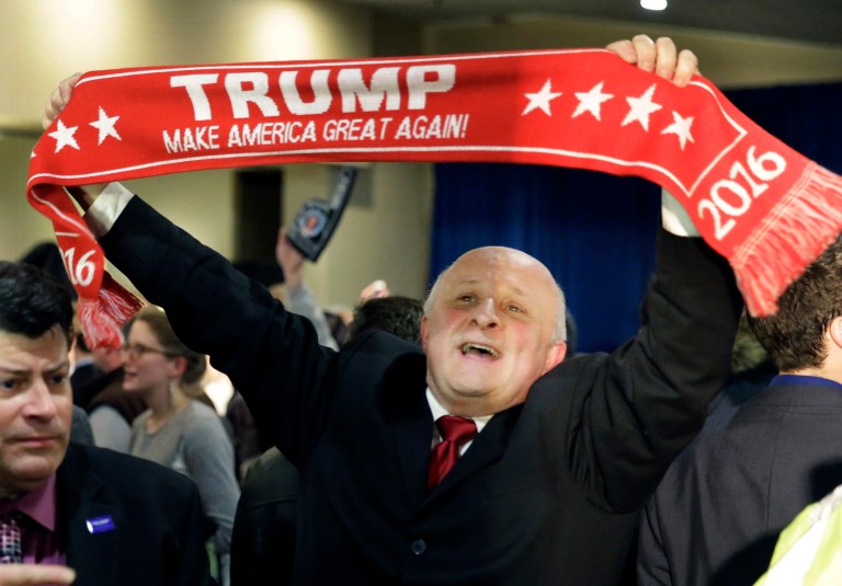 Fervent supporters of Donald Trump say they are victims and see the billionaire candidate as someone who will make them winners again. (AP Photo/David Goldman)