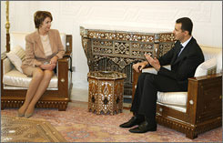  House Minority Leader Nancy Pelosi, D-Calif., with Syrian dictator Bashar al Assad in 2007 / AP 
