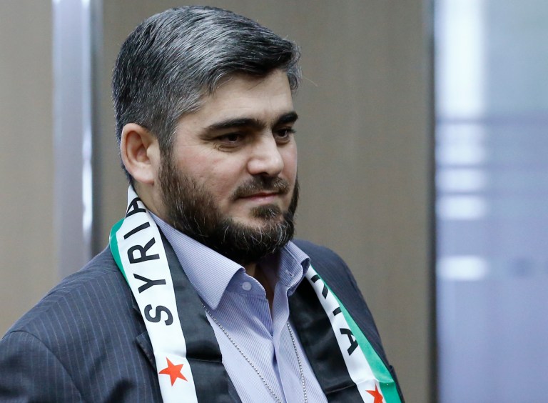 Mohamed Alloush, of the Jaysh al Islam, arrives for a meeting with U.N. mediator Staffan de Mistura, during the Syria peace talks at the United Nations in Geneva, Switzerland, Tuesday March 22, 2016. (Denis Balibouse/Pool Photo via AP)