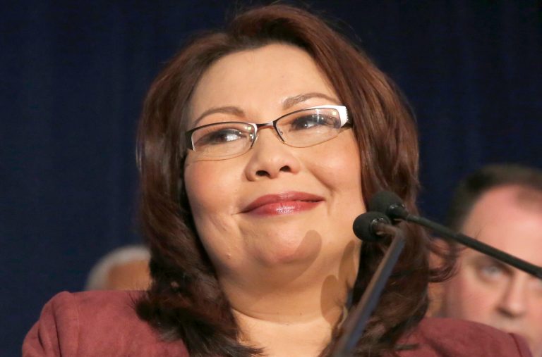 Sen. Tammy Duckworth, D-Ill, on Saturday blasted President Trump as a leader who has failed to keep his promises four weeks into office. (AP Photo/Charles Rex Arbogast)