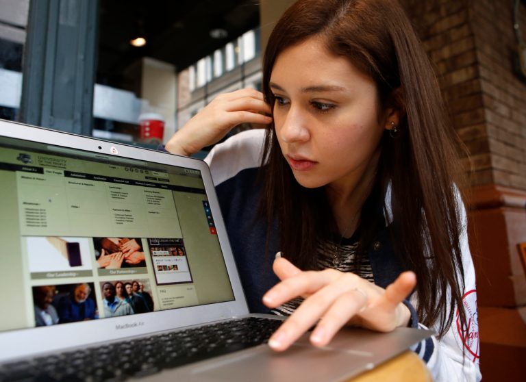 President Trump is expected to sign an executive order on Tuesday that recommends federal agencies revise the temporary visa program that allows foreigners to fill high-skilled jobs in the U.S. (AP Photo/Kathy Willens)