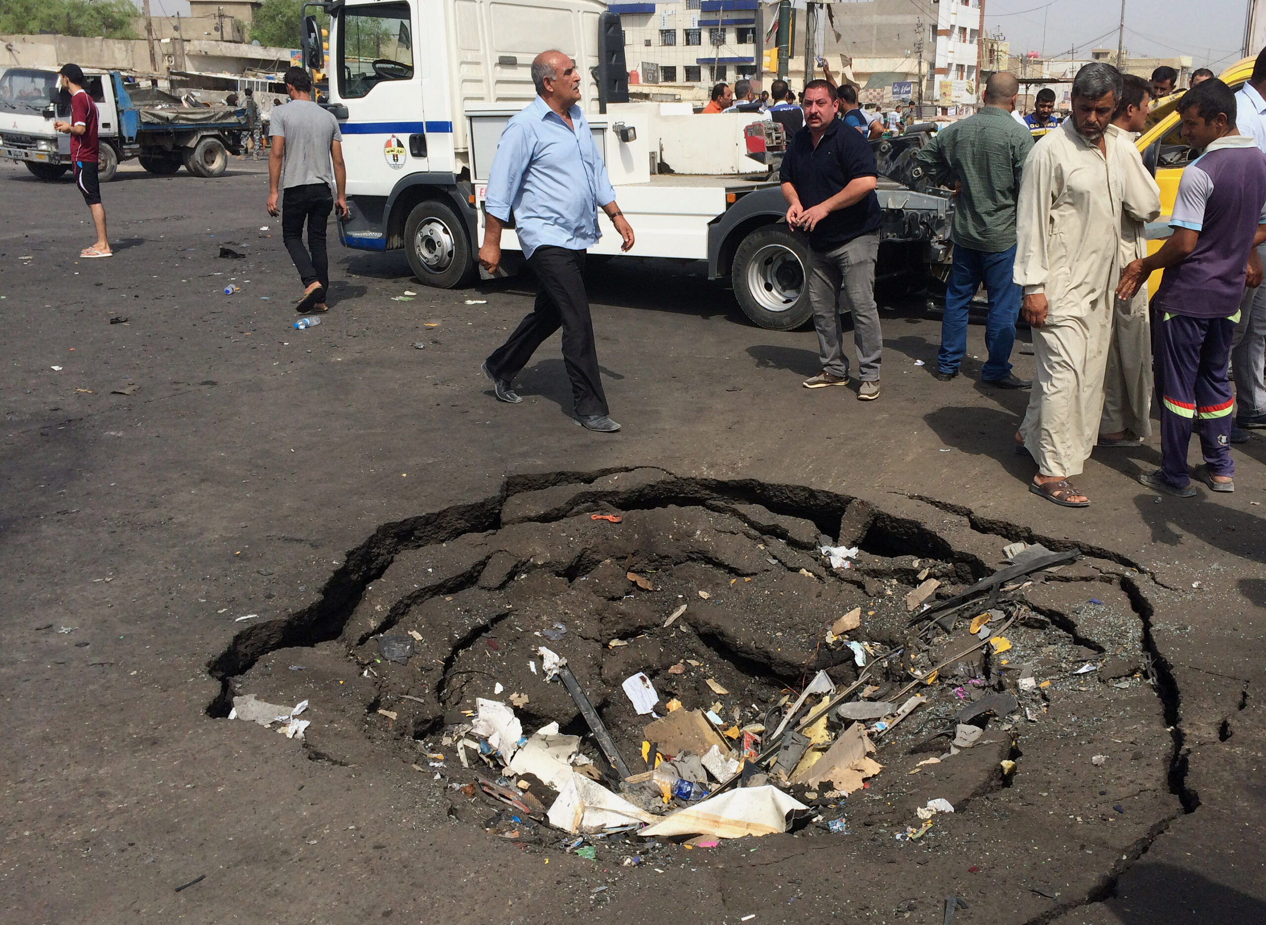 Car bombing kills at least 11 people in Baghdad