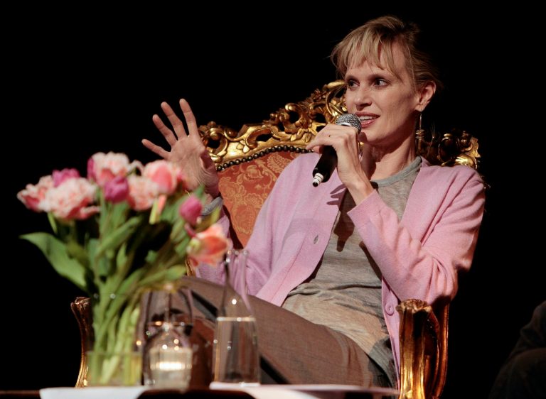 FILE - In this April 11, 2008, file photo, U.S. writer Siri Hustvedt answers questions during a reading in Zurich, Switzerland. The Americans have arrived in force for Britain's Booker literary prize. Five U.S.-based writers are on the 13-book long-list for the prestigious fiction award. The list, announced Wednesday, includes Americans Joshua Ferris, Karen Joy Fowler, Siri Hustvedt and Richard Powers, as well as Irish-American writer Joseph O'Neill. (AP Photo/Keystone/Eddy Risch, File)