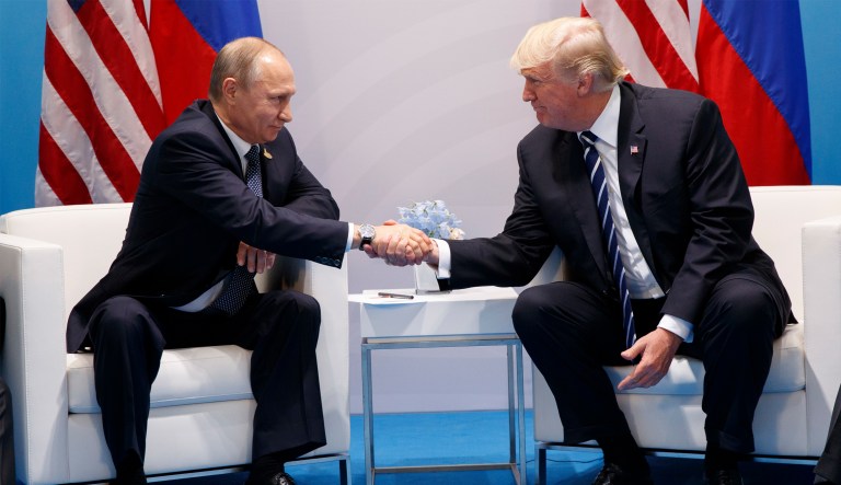 On the U.S. side, only Trump, Secretary of State Rex Tillerson and a translator attended the meeting. President Trump shakes hands with Russian President Vladimir Putin at the G-20 Summit July 7 in Hamburg. (AP Photo/Evan Vucci)