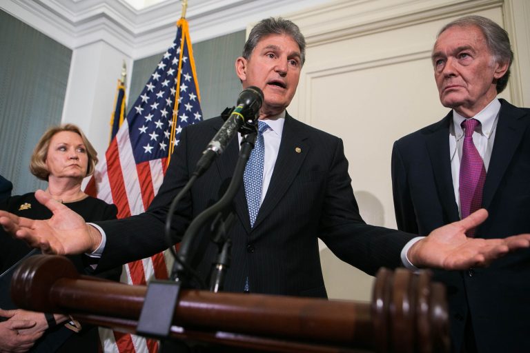 Sens. Joe Manchin, center, and Ed Markey, right, are concerned about Dr. Robert Califf's ties to the drug industry. (Graeme Jennings/Washington Examiner)