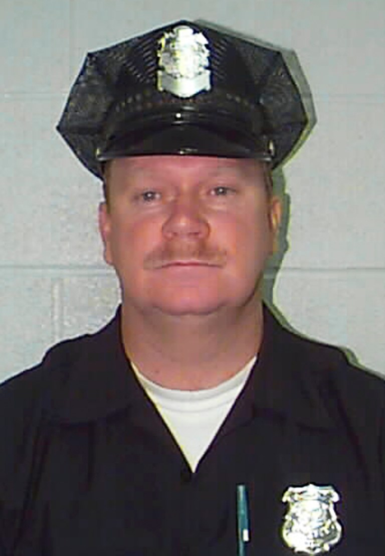   This undated photo provided by the Springfield, Mass., Police Department shows officer Kevin Ambrose, who was shot and killed Monday, June 4, 2012 while responding to a domestic violence call. Police said New York City correction officer Shawn Bryan, of Hempstead, N.Y., shot the Ambrose through the door of his ex-girlfriend's apartment, shot the girlfriend and then fatally shot himself outside in a car. (AP Photo/Springfield Police Department)  