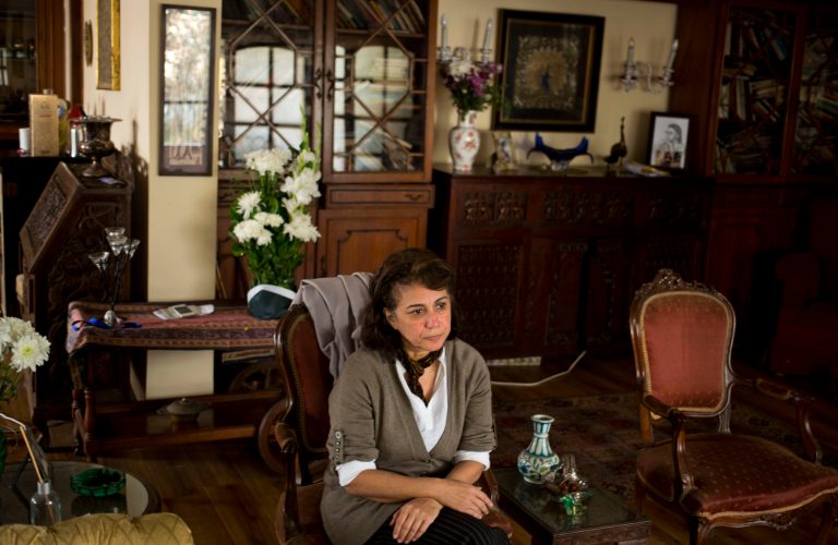 Hala Shukrallah, a 59-year-old Coptic Christian, who is the first woman elected to head an Egyptian political party speaks to The Associated Press during an interview in her house in Cairo, Egypt, Monday, Feb. 24, 2014. Shukrallah said that Egypt is not headed toward democratic rule and the military-backed authorities have little tolerance for dissent, criticizing their security crackdown that brought mass detentions and trials over the past months. (AP Photo/ Khalil Hamra