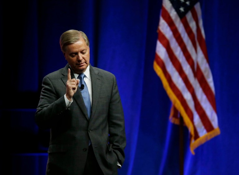 Sen. Lindsey Graham is reportedly encouraging Republicans to support Donald Trump, who he previously a 'race-baiting, xenophobic' bigot. (AP Photo/John Raoux, File)