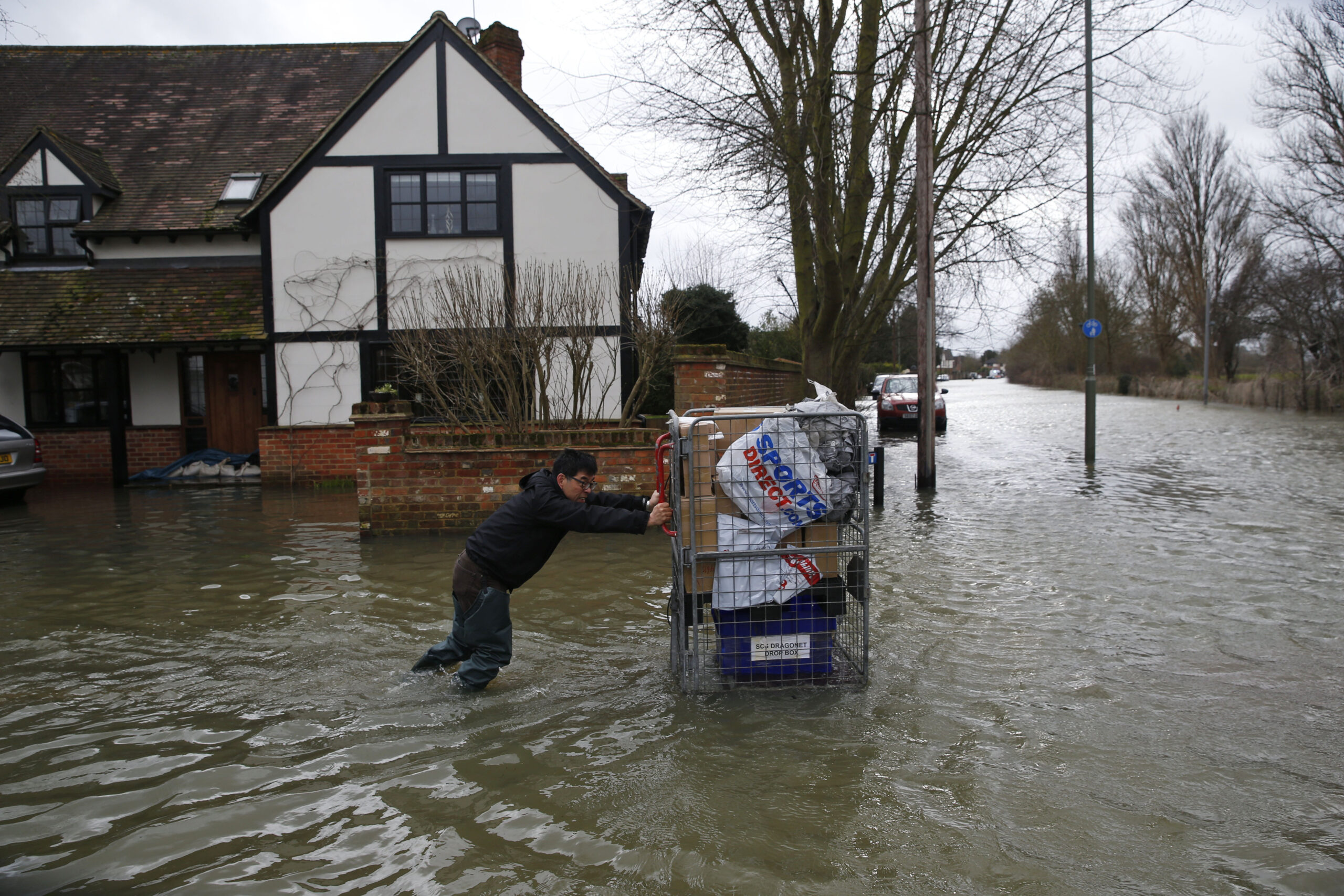 Storm with 100 mph gusts hits soggy Britain