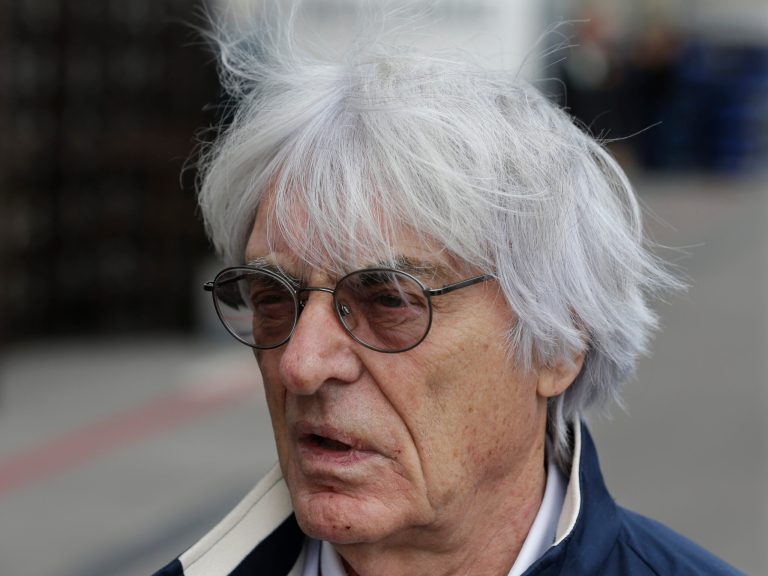 President and CEO of Formula One Management Bernie Ecclestone arrives at the Circuit of the Americas for the Formula One U.S. Grand Prix auto race, Thursday, Nov. 14, 2013, in Austin, Texas. (AP Photo/Darron Cummings)