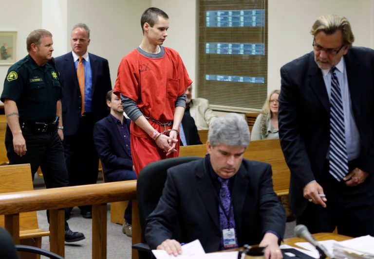 Colton Harris-Moore, center, known as the 