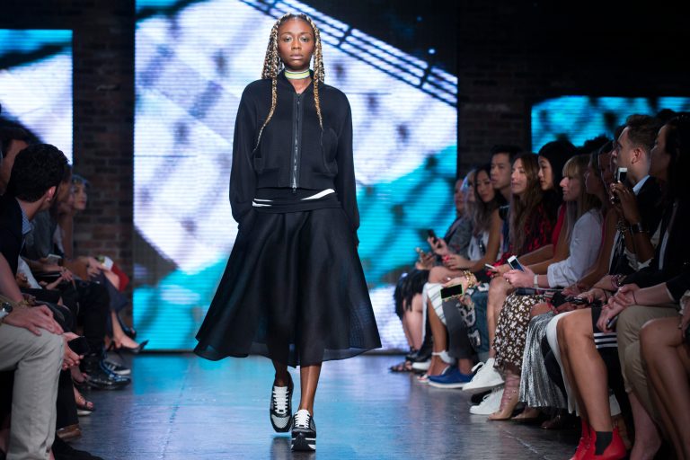 The DKNY Spring 2015 collection is modeled during Fashion Week, Sunday, Sept. 7, 2014, in New York. (AP Photo/John Minchillo)