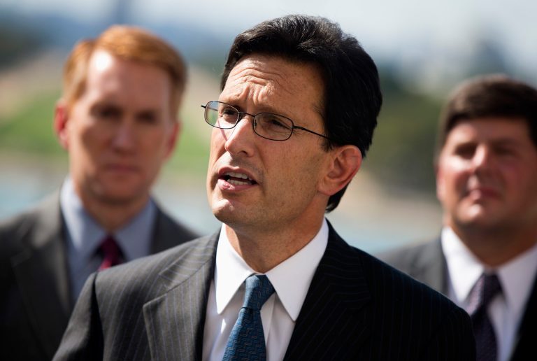 House Majority Leader Eric Cantor of Va., accompanied by Rep. James Lankford, R-Okla., left, Rep. Steven Palazzo, R-Miss., speaks during a news conference on Capitol Hill in Washington, to discuss the budge battle. (AP Photo/ Evan Vucci)